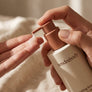 Smoothing Serum held in hand